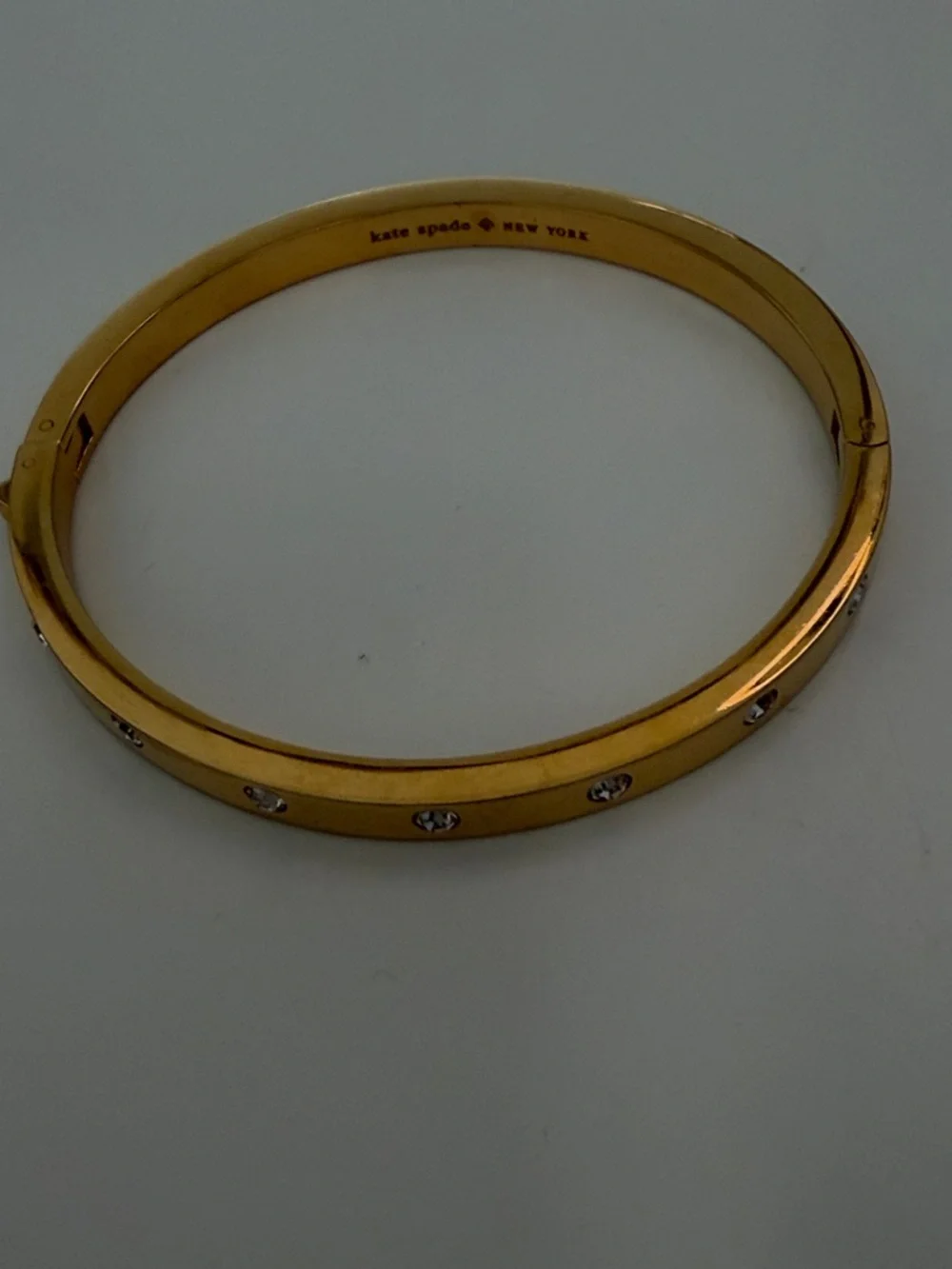 kate spade gold-tone crystal accent hinged bangle bracelet - Picture 1 of 1